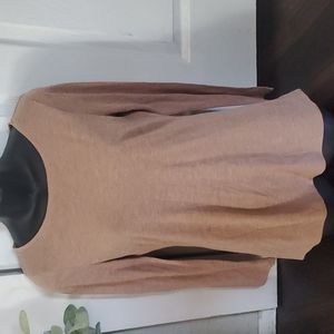 Tan heather in color. womens size small. long sleeve